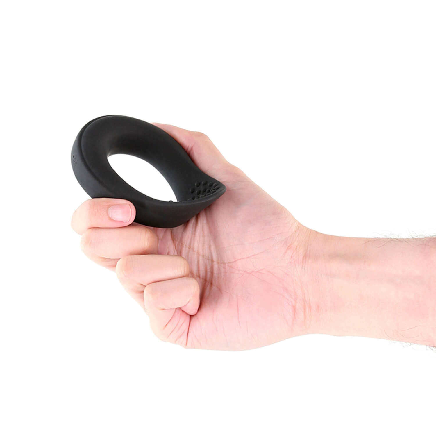 Renegade Slider vibrating black cock ring held in hand demonstrating its size and shape