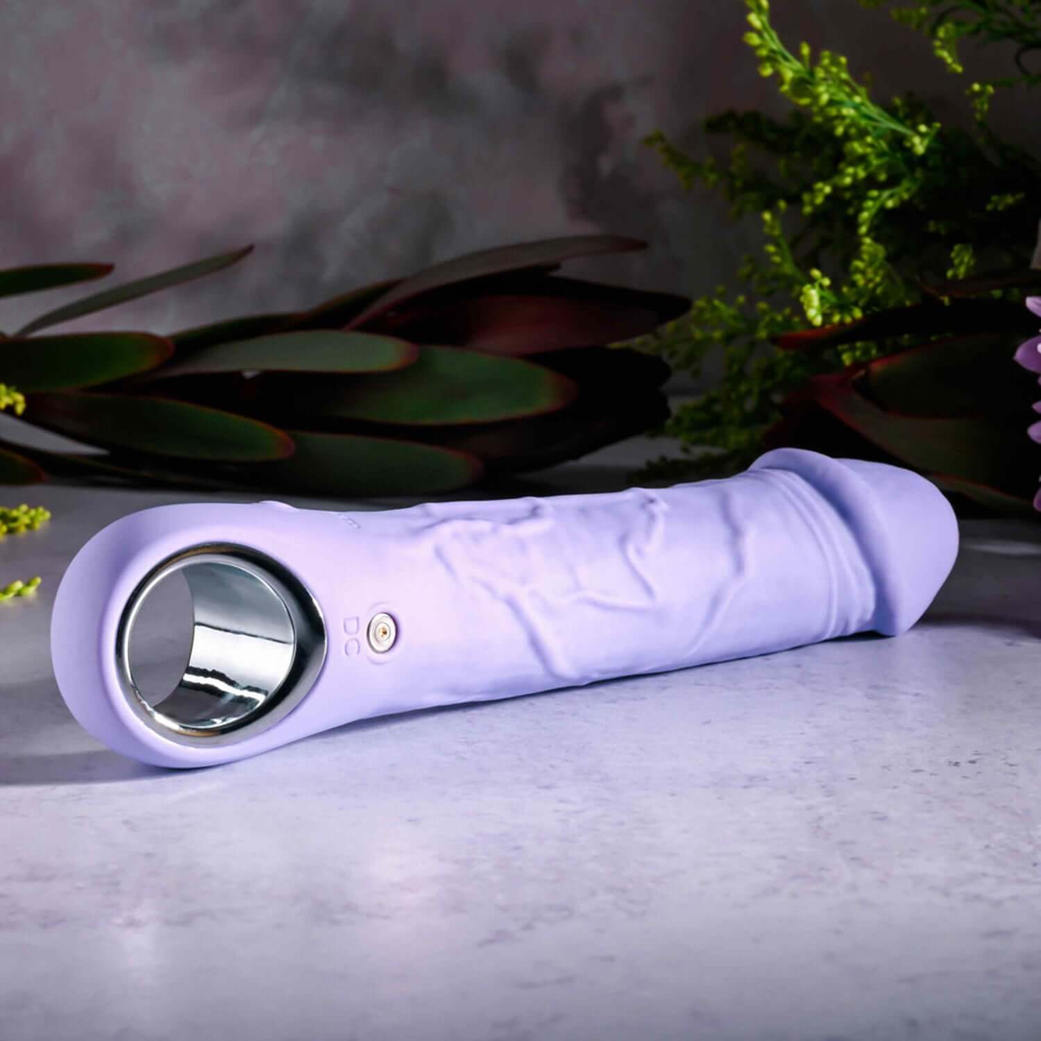 Purple Fantasy Vibrator featuring lifelike textures and chrome handle, perfect for multi-speed pleasure.