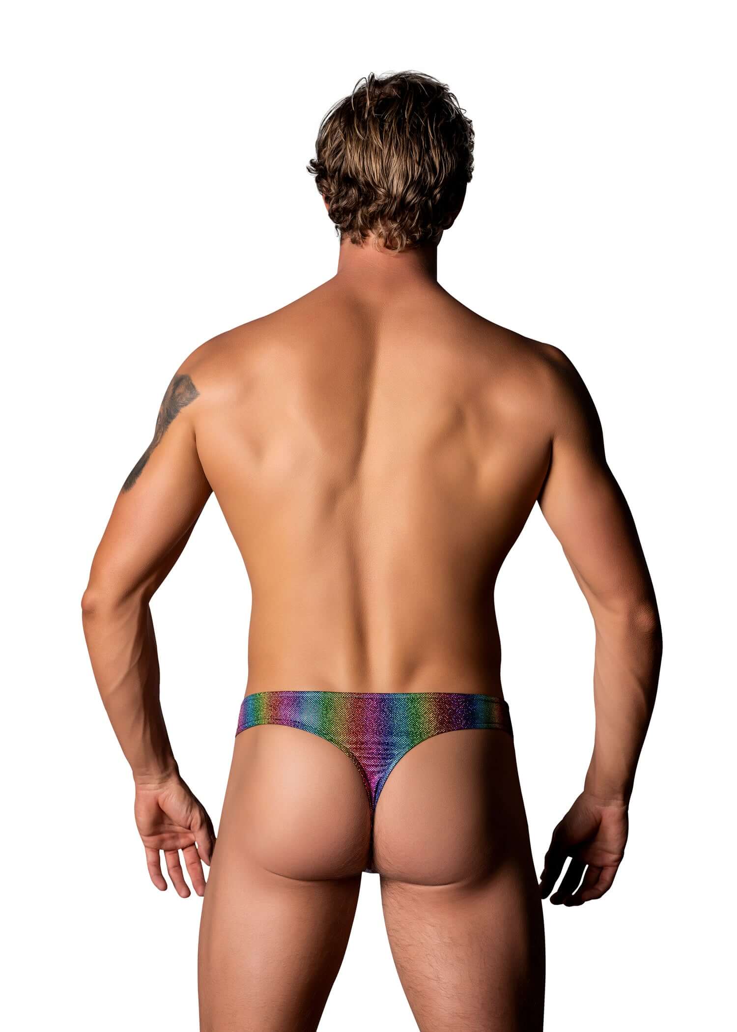 Back view of a male model wearing a rainbow Pack and Play thong with front condom pouch, showcasing vibrant colors and sleek design.