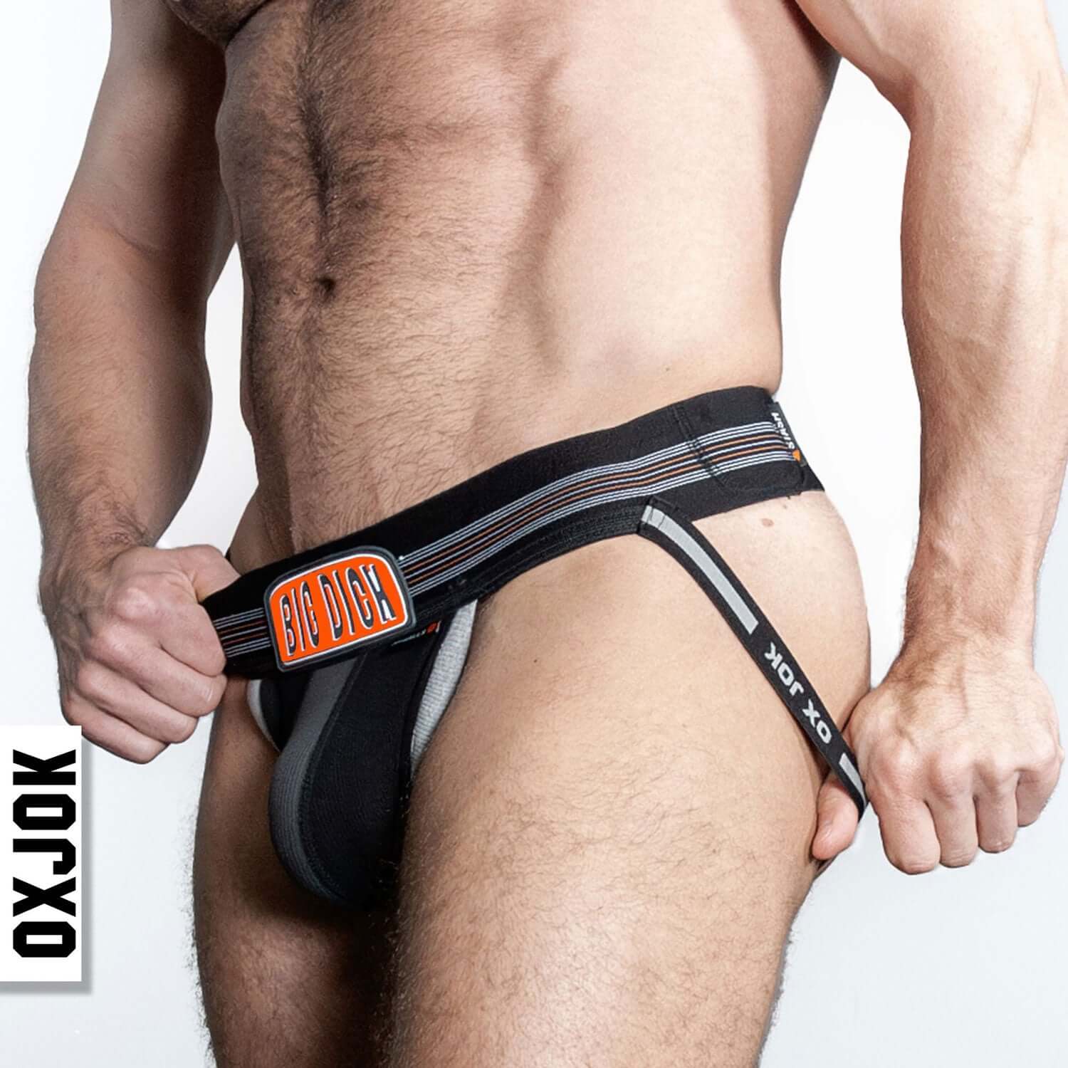 Man wearing Bulger the Big Pouch Jock in Black Iron Small, designed for larger packages with thick padded rim and extra room for comfort.