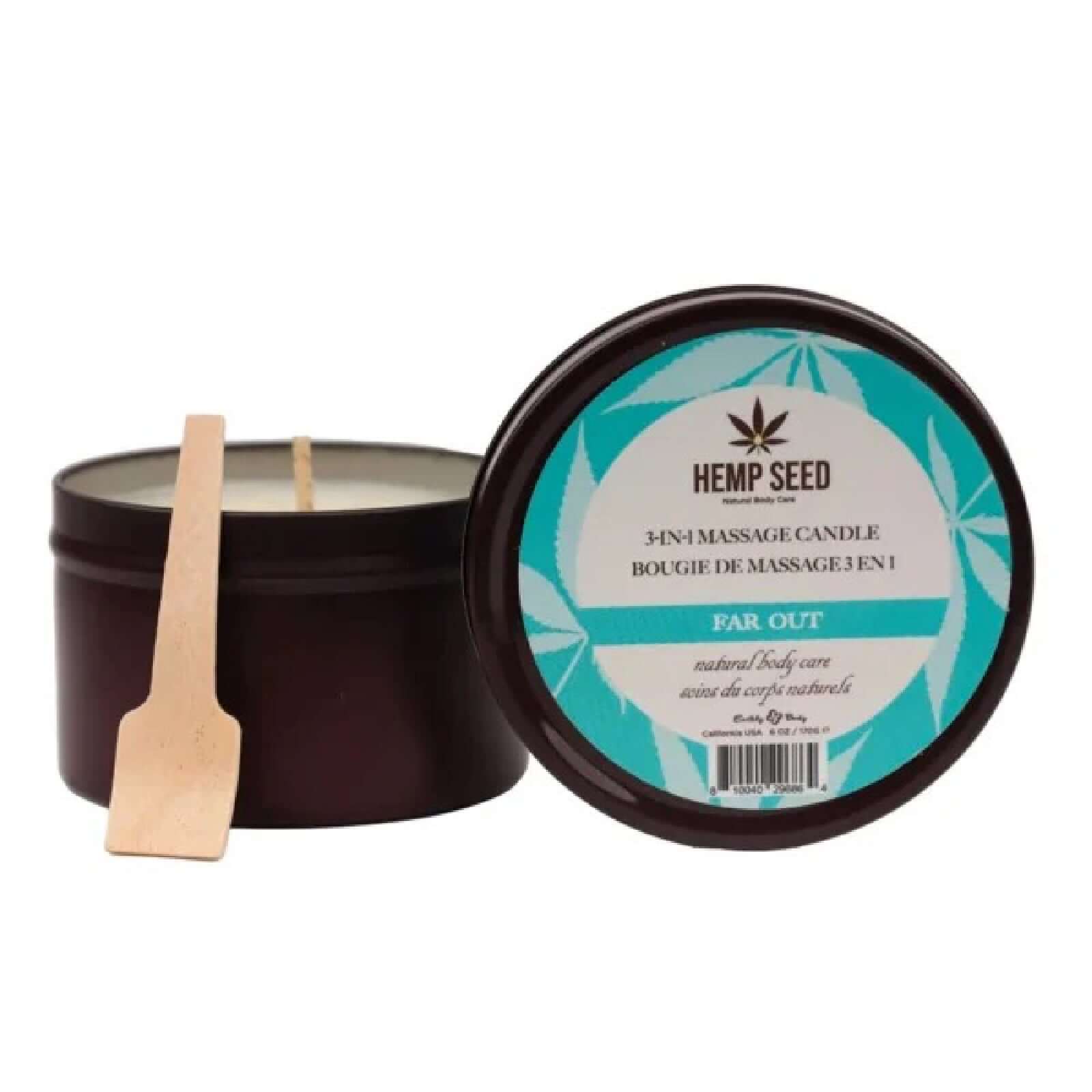 Hemp Seed 3-in-1 Massage Candle Far Out 6 Oz with lid and wooden spoon, ideal for setting a calming ambiance and providing a relaxing massage.