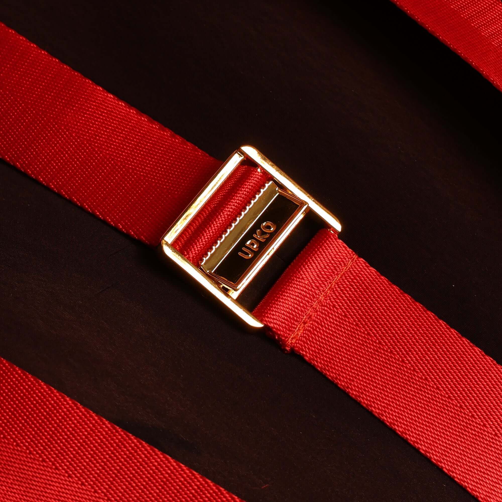 Close-up of red strap with gold buckle on Bowknot Hogtie Portable Bondage Gear, emphasizing quality and design.