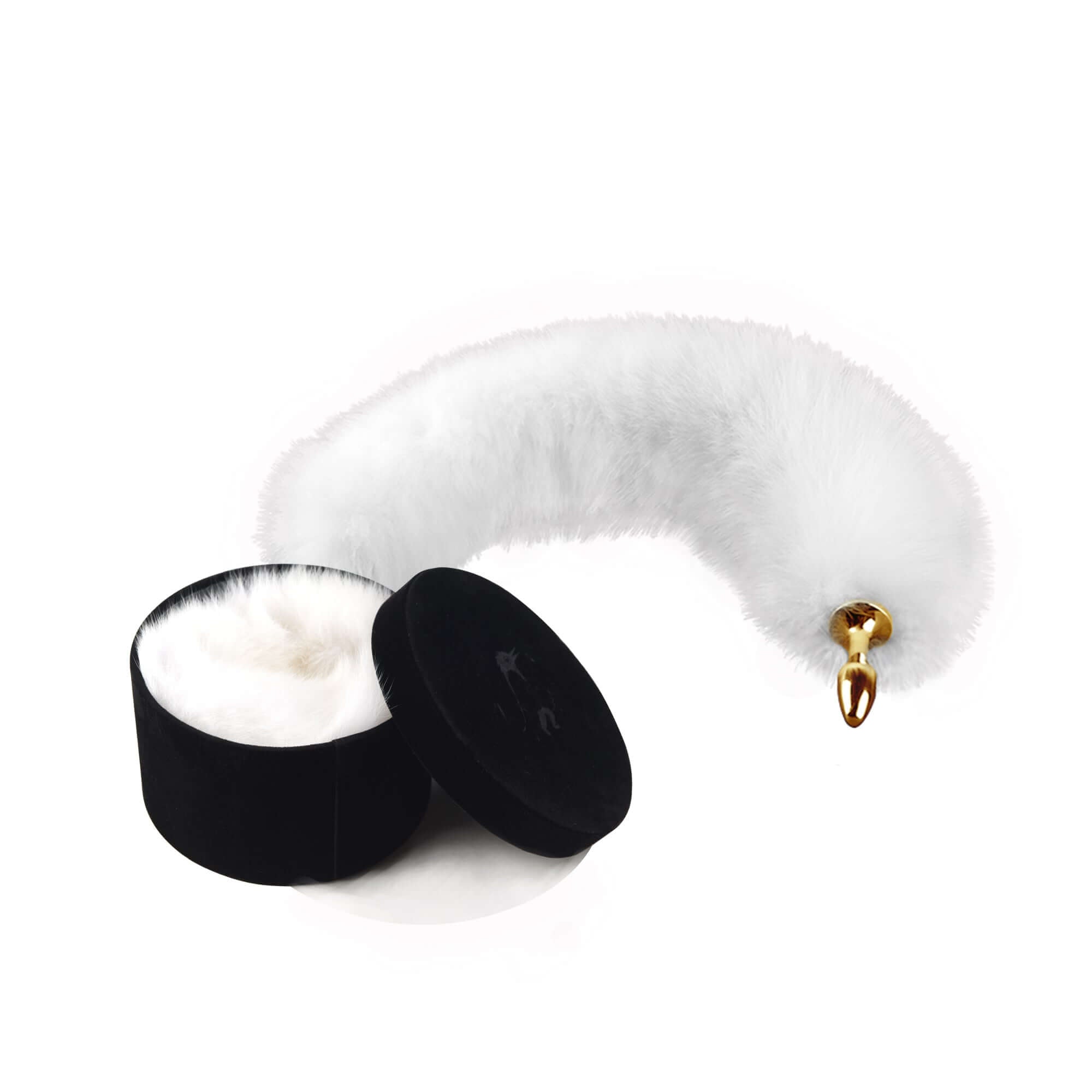 White fox fur tail anal plug with gold-plated tip and black packaging by UPKO, ideal for beginners and sensual play.