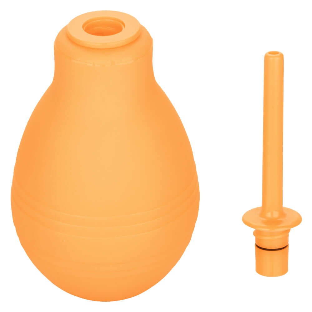 Cheeky One-Way Flow Douche in orange with slender nozzle.