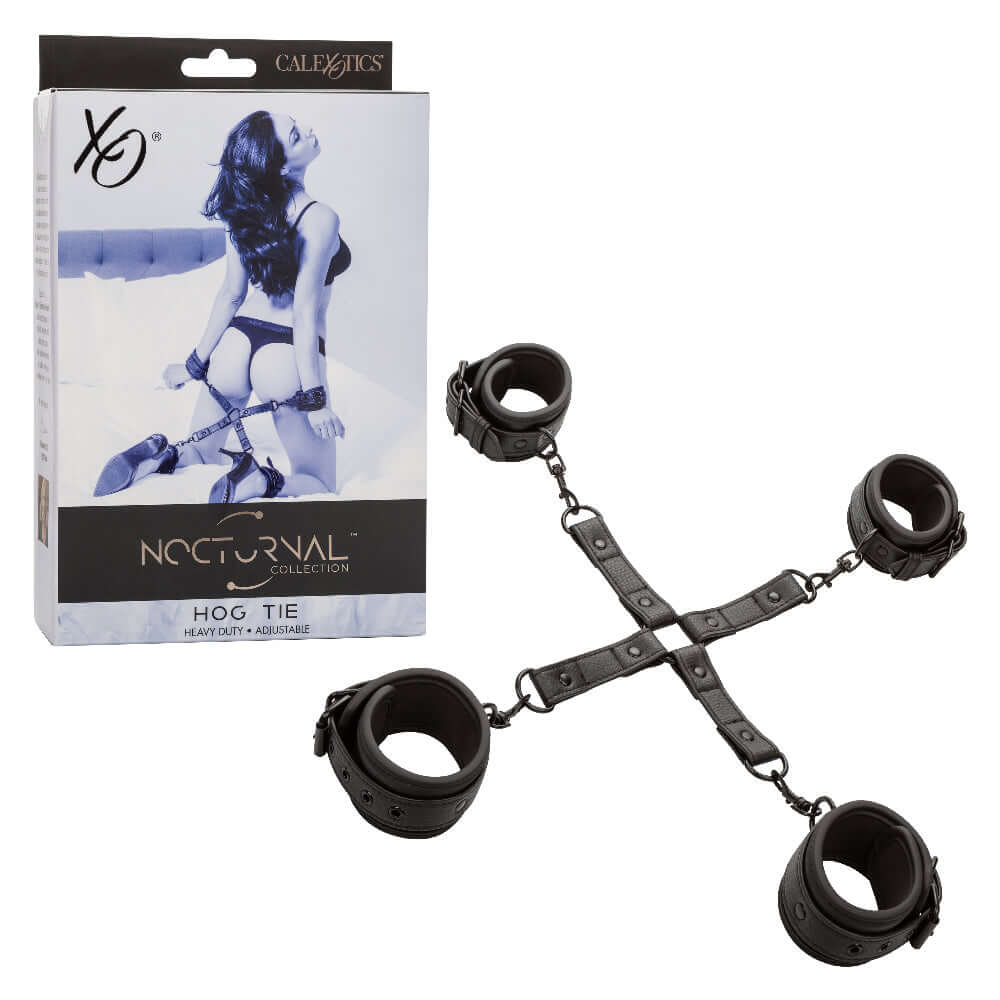 Nocturnal Collection Hog Tie in black with adjustable cuffs and secure buckle closures for restraint play, shown with packaging.