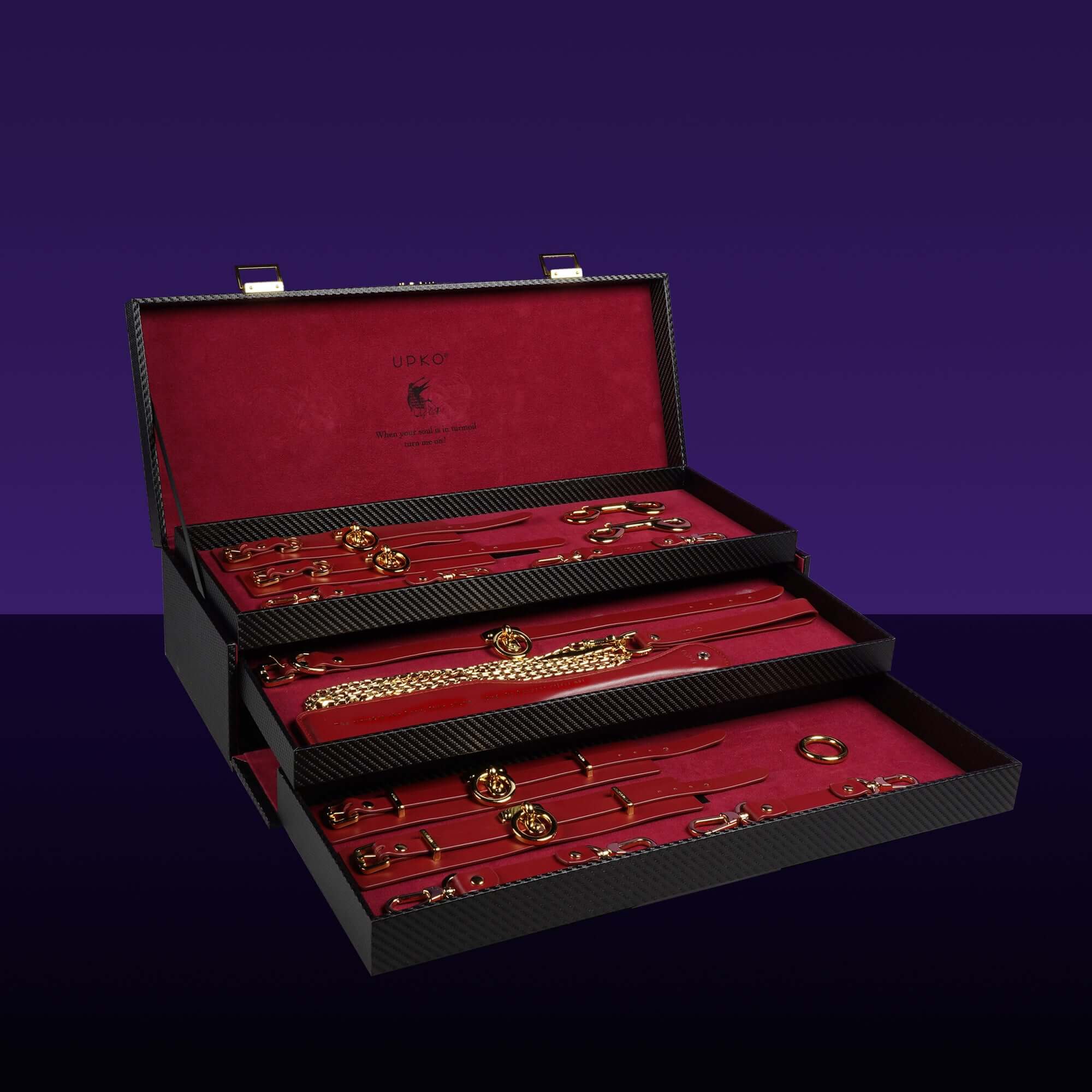 UPKO Italian leather bondage tools set displayed in a luxurious red and black case, showcasing BDSM accessories.