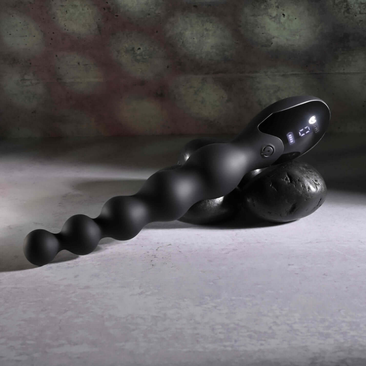 Flexible black beaded vibrator with 9 speeds, USB rechargeable, waterproof, and designed for backdoor pleasure.