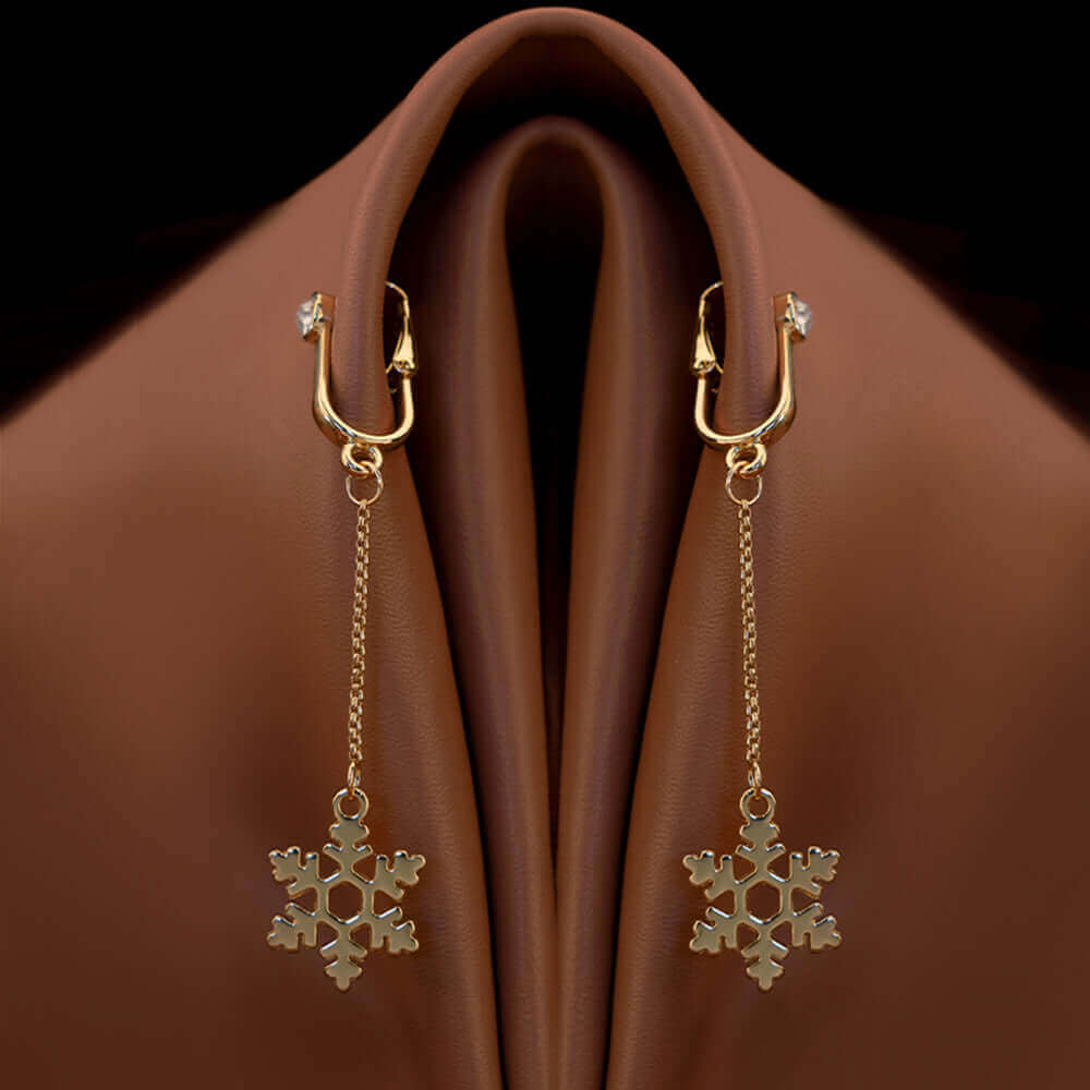 Elegant non-pierced snowflake jewelry clips designed for intimate wear, showcasing unique gold design.