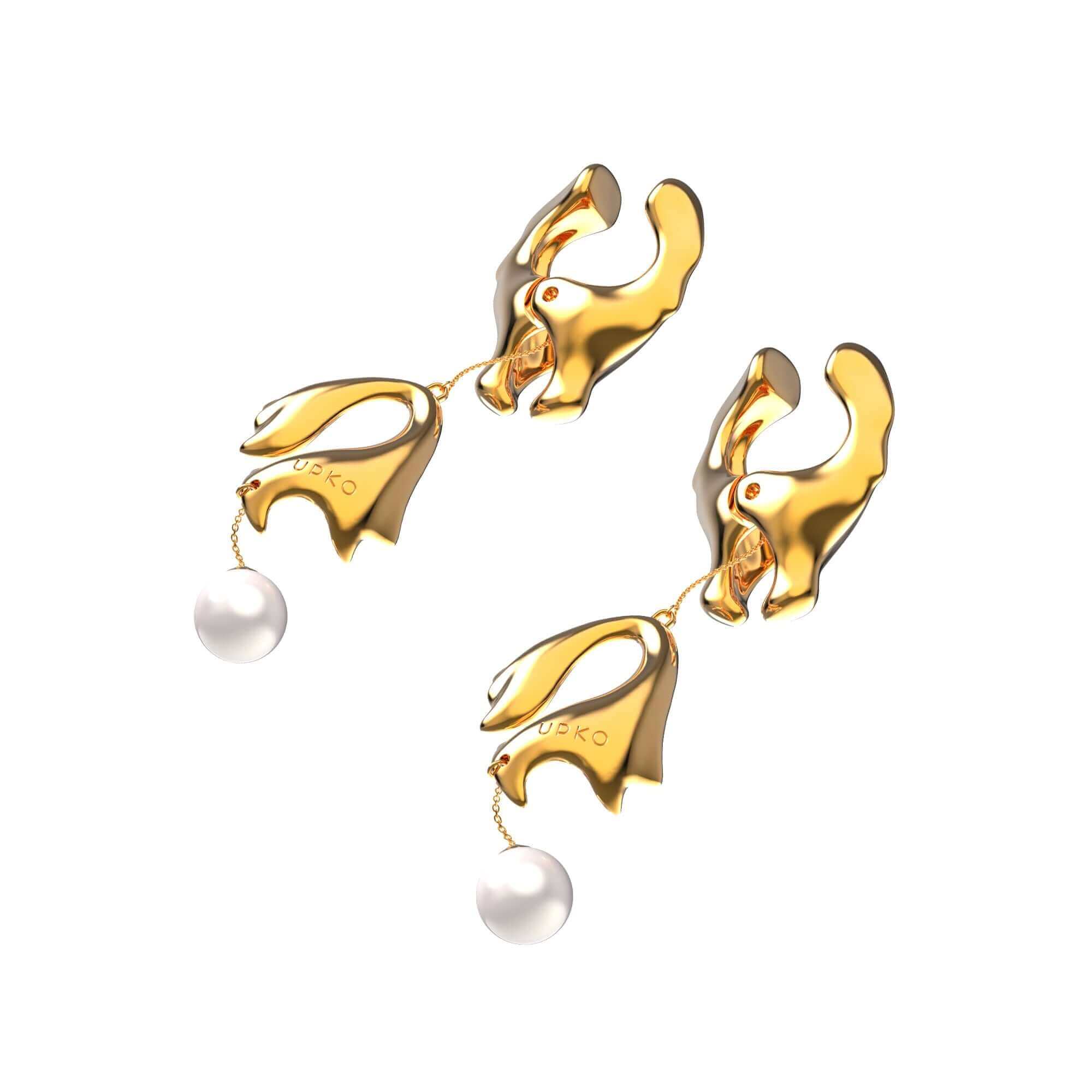 Elegant gold nipple clamps with pearl detail, inspired by nature's beauty and designed for sensual feminine appeal.