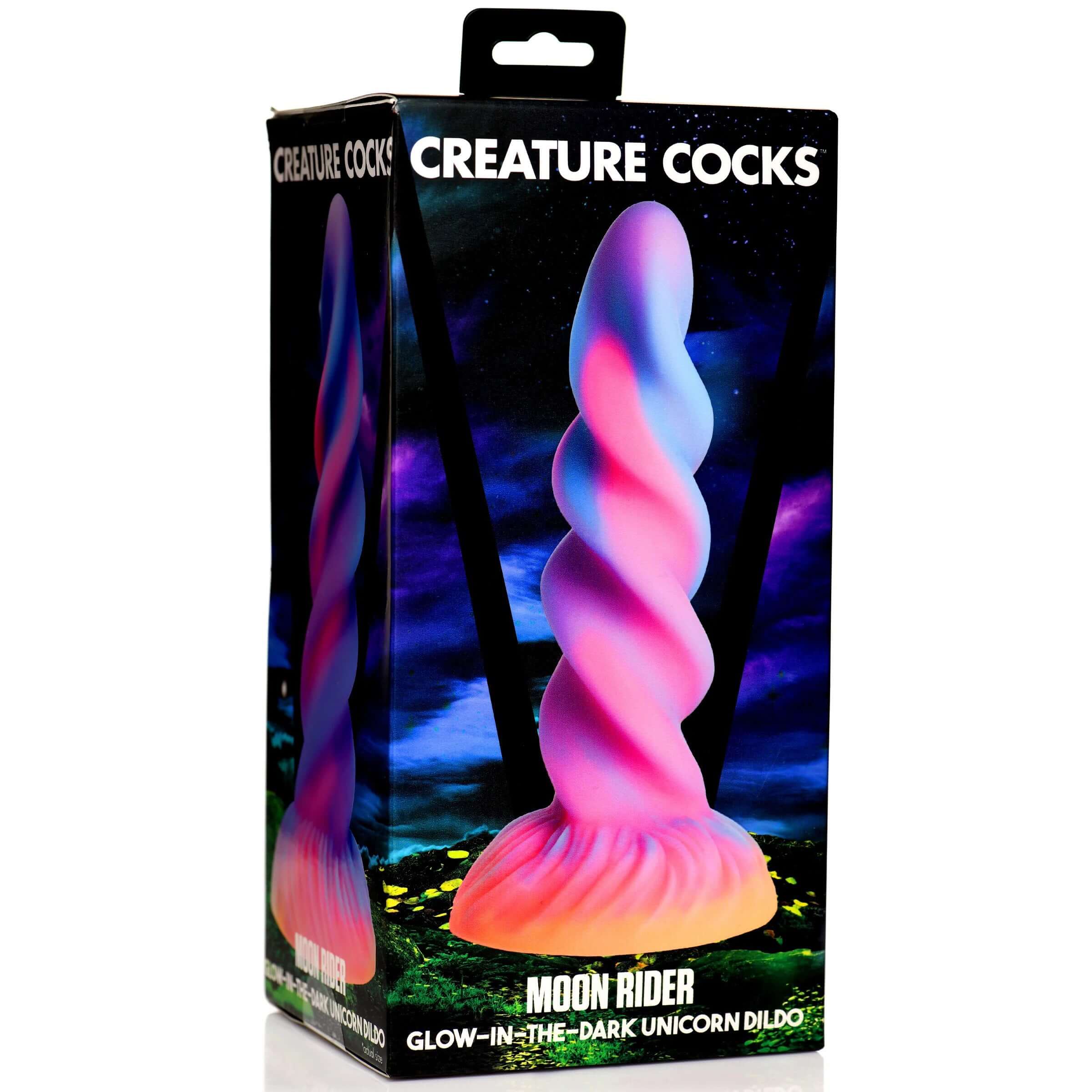 Moon Rider Glow-in-the-Dark Unicorn Dildo in packaging with vibrant colors of purple, blue, pink, and yellow on front display.