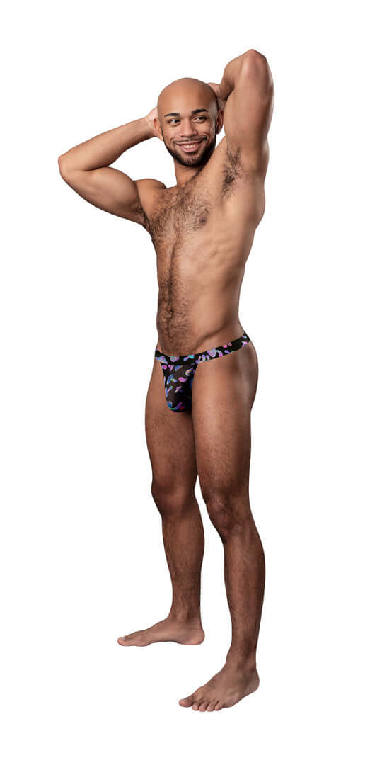 Man wearing Hazy Dayz Micro Thong - Mushroom, Large/x-Large, displaying comfort and fit with superior styling and support.