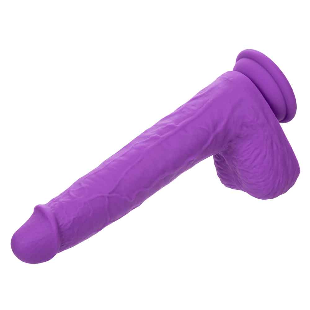 Rechargeable gyrating and thrusting purple silicone stud for intense pleasure.