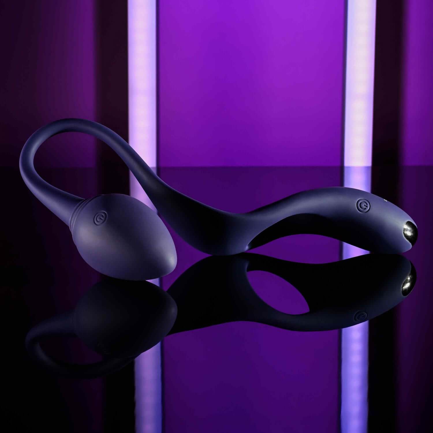 Purple Tip to Tail Vibrating Plug and Ring with flexible design and 7 vibrating speeds, set against a sleek backdrop.