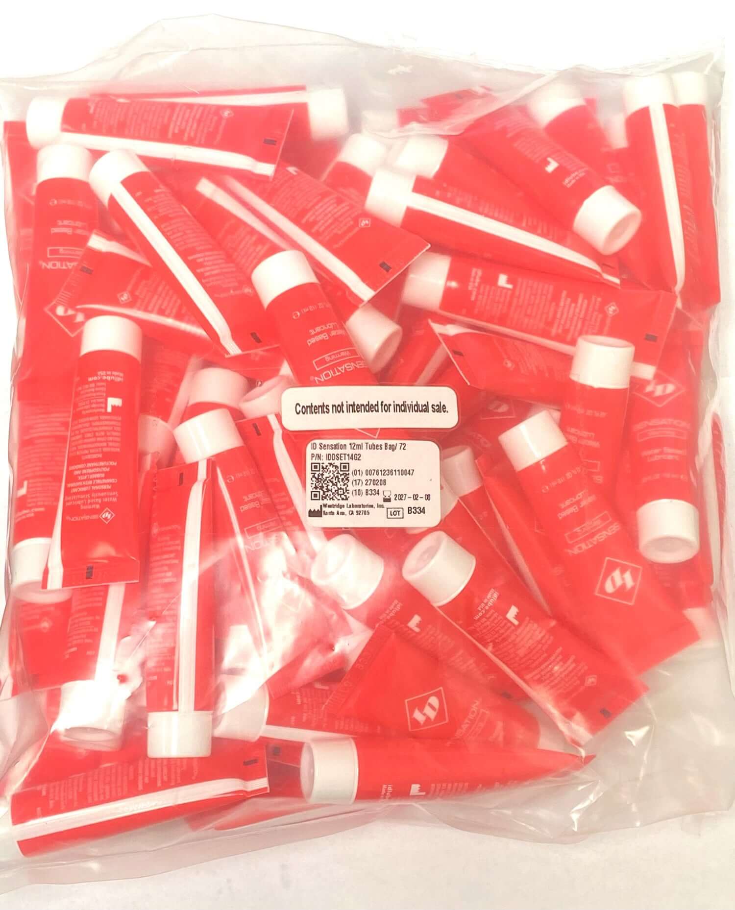 ID Sensation warming lubricant 12 ml tubes in a bag of 72, showcasing red packaging for igniting passion and pleasure.