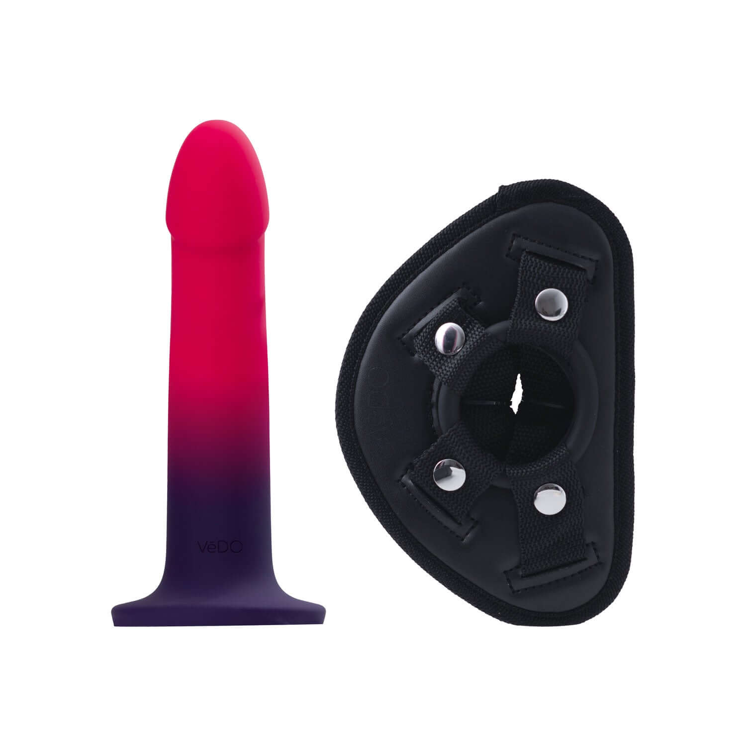 Vedo Duo semi-realistic pink-purple dildo with harness and suction cup for versatile use on smooth surfaces.