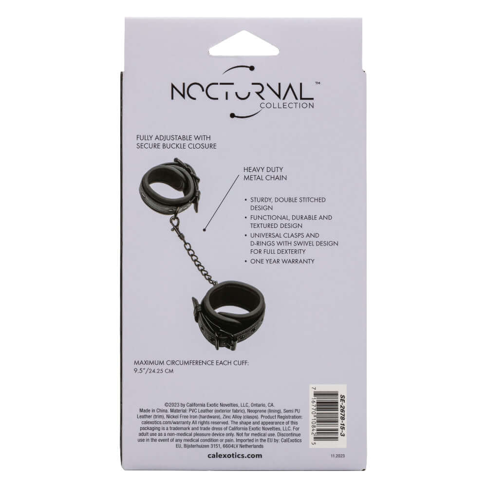 Packaging of Nocturnal Collection Wrist Cuffs showing adjustable black cuffs with heavy-duty metal chain.