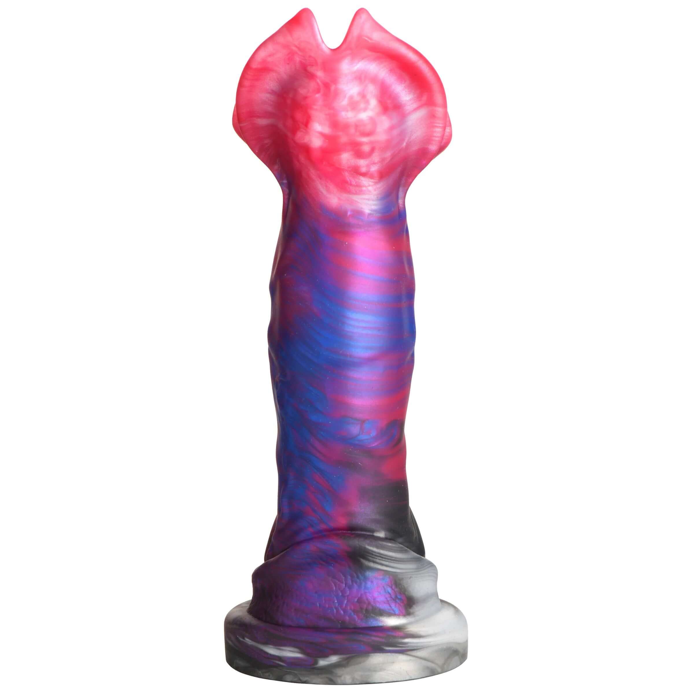 Demogorgon Silicone Dildo with fearsome face, bumps, and curved shaft standing upright on a flat surface