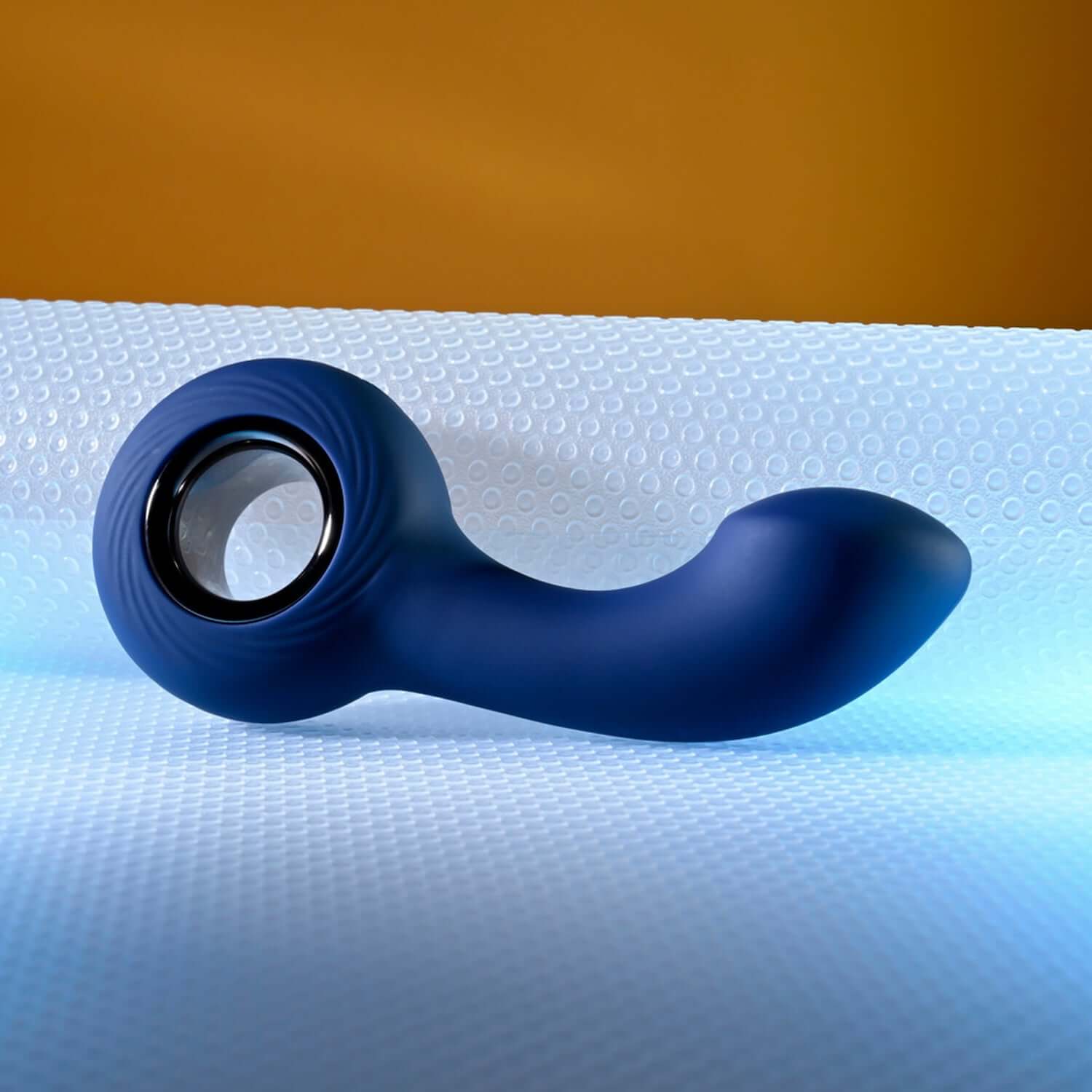 Blue anal vibrator with a ringed handle and flexible curved shaft for ideal P-spot stimulation.