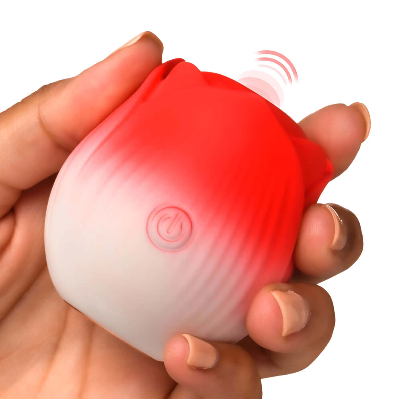 Hand holding the Pulsing Petals Throbbing Rose Stimulator in red, made of premium silicone, showcasing its compact size and power button.