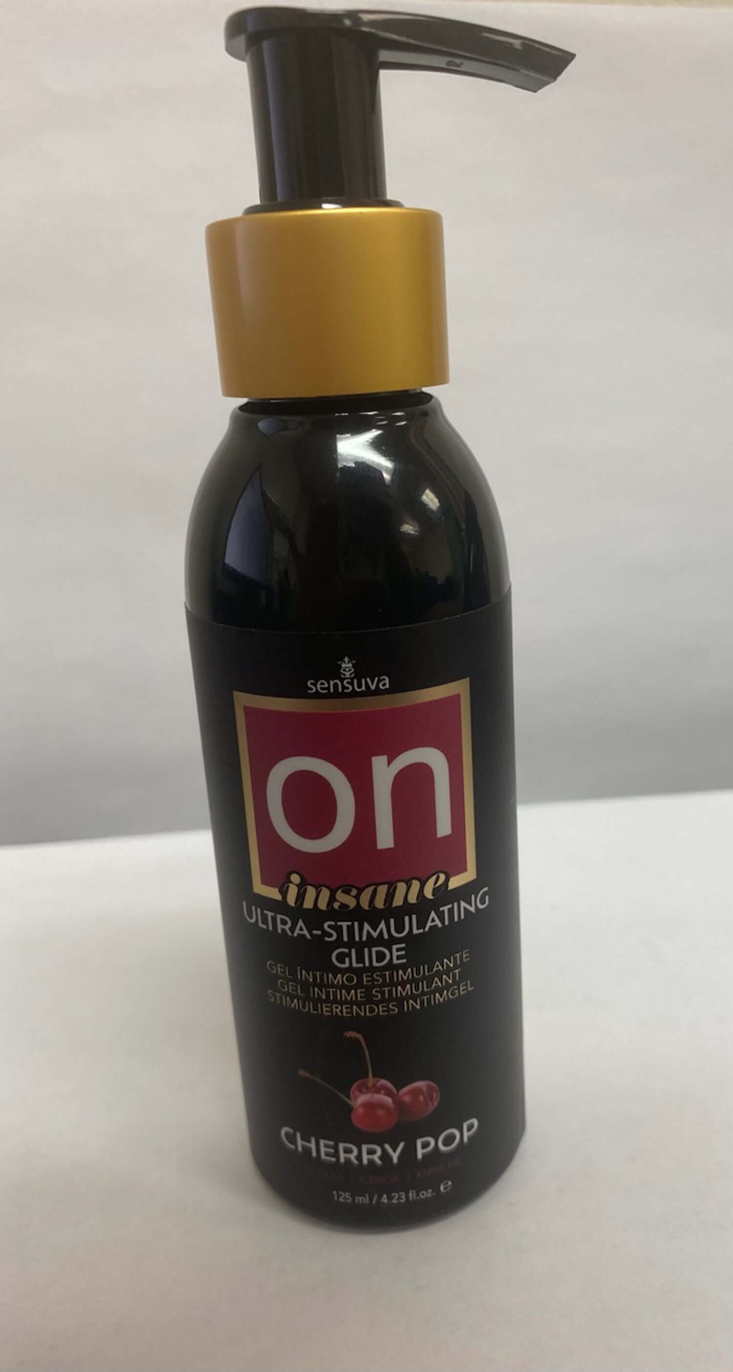 On Insane Ultra-Stimulating Personal Moisturizer 4oz Cherry Pop in black pump bottle for enhanced sensation and movement.