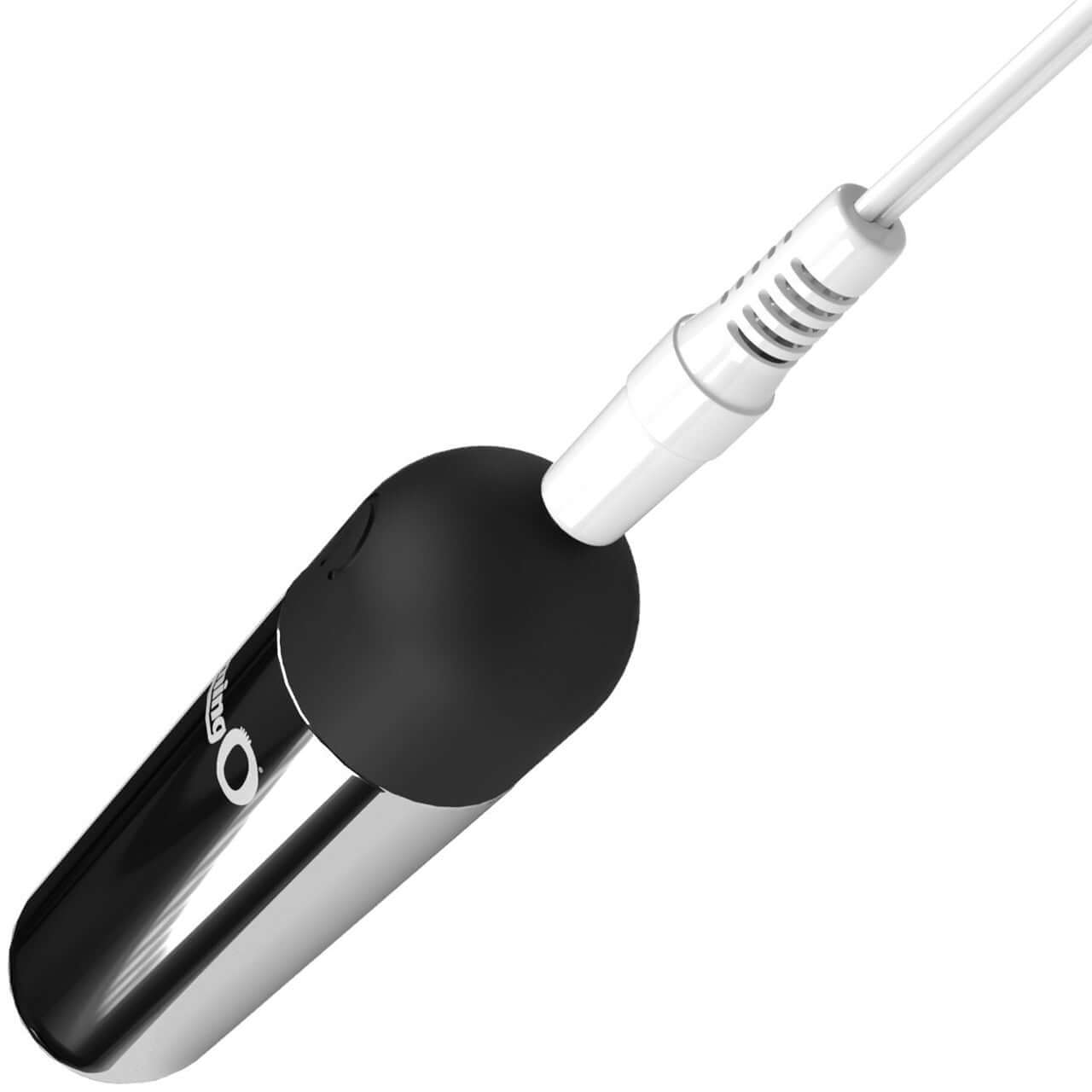 Screaming O Rechargeable Bullet - Silver, a compact and powerful vibrating bullet with charging cable connected.