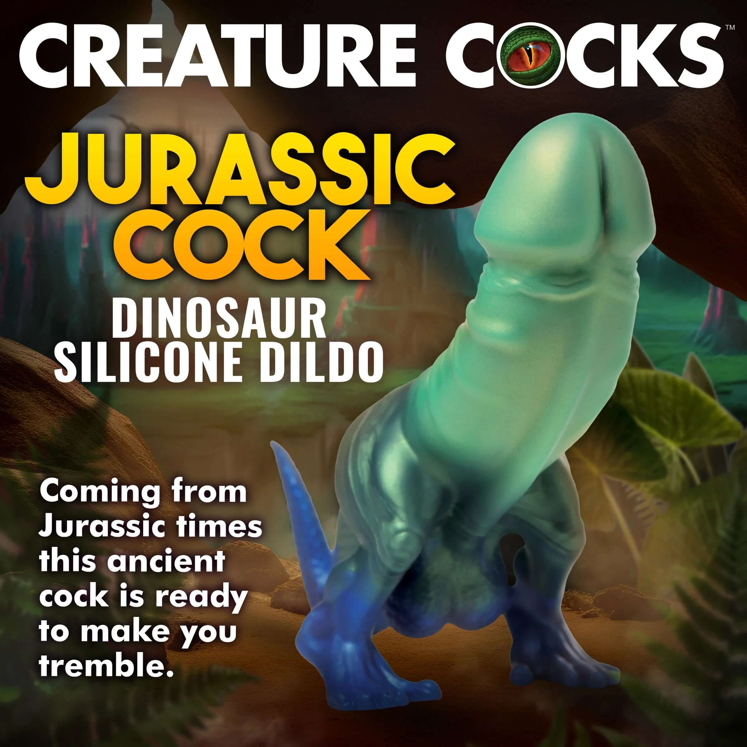 Jurassic Cock Dinosaur Silicone Dildo in green and blue with dinosaur legs, tail, and veined curved shaft on a promotional display.